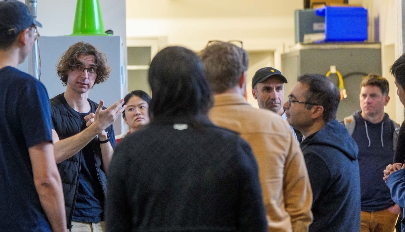 The team talking through results in the lab